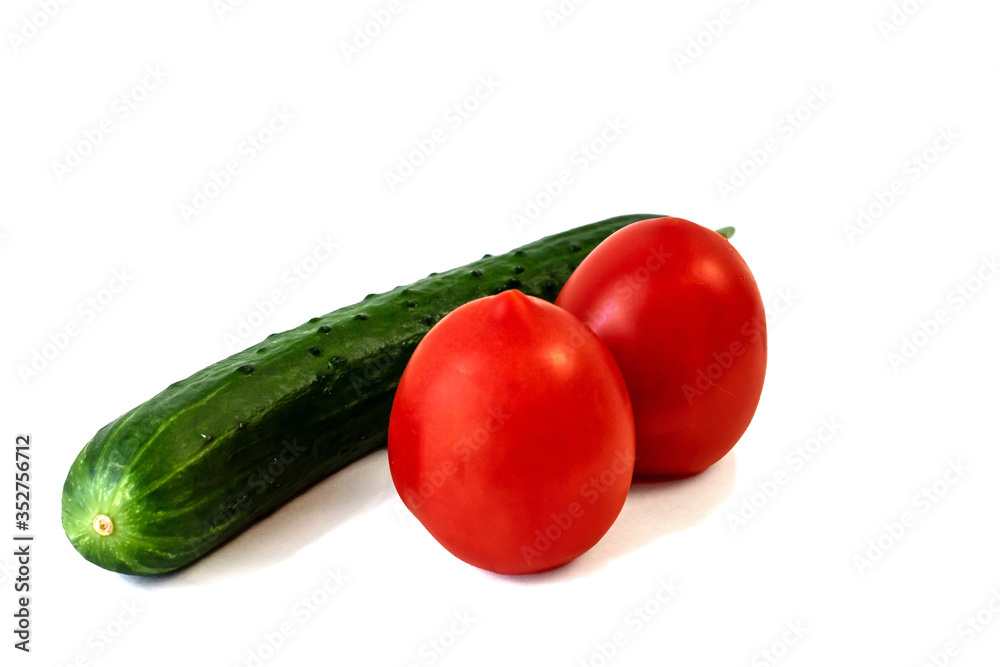 Isolated on white background cucumber and tomato Isolated on white background cucumber and tomato