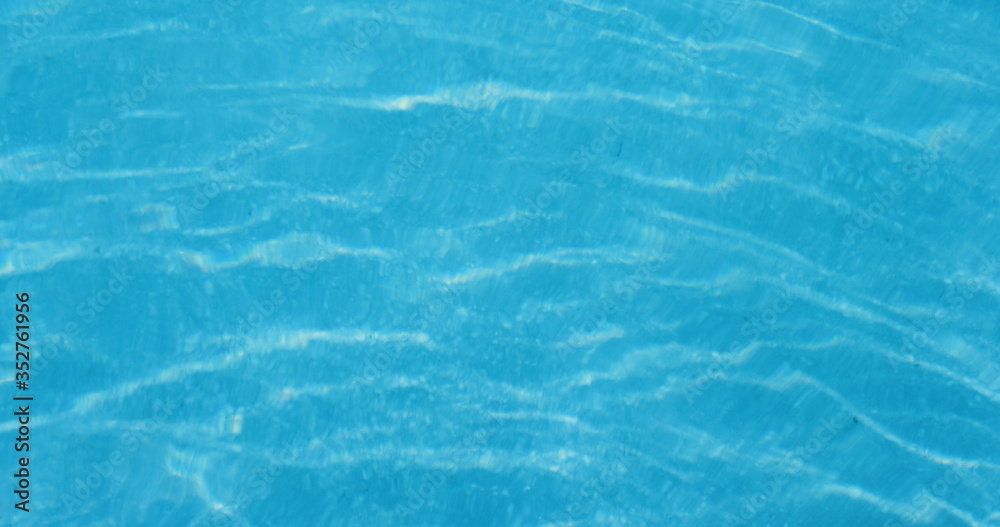 Swimming pool water texture in blue color