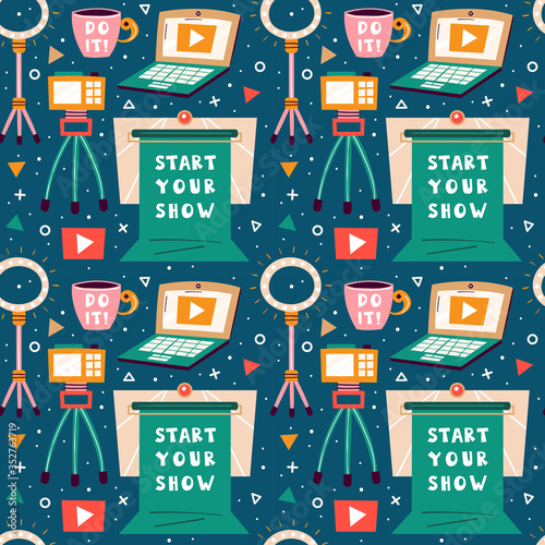 Blogging, vlogging set. Filming items. Laptop, camera, tripod, lightning, cup of coffee, chroma key. Flat colourful vector seamless pattern, texture, background, backdrop isolated on blue background. 