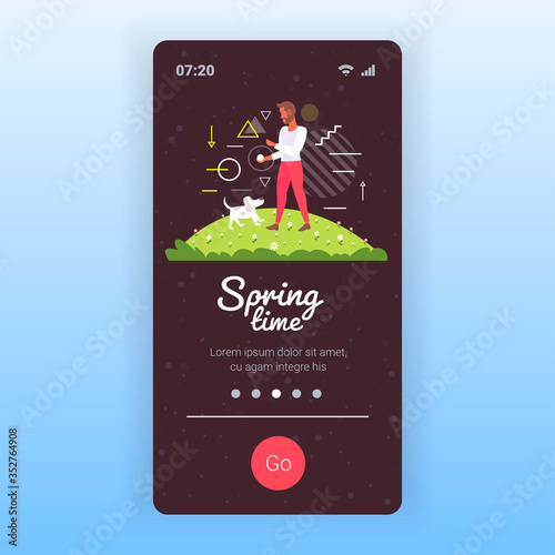 young man walking with dog outdoors at park guy relaxing with pet spring time concept smartphone screen mobile app copy space full length vector illustration