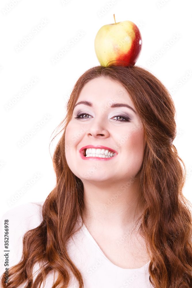 Woman funny girl holds on head apple fruit Woman funny girl holds on head apple fruit