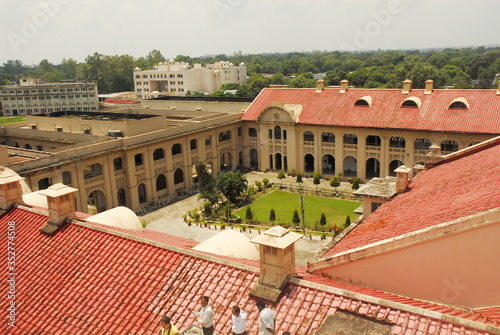 New Delhi, Delhi/India- May 20 2020: Traditional red colored inclined roof top of the rainproof vintage bungalow.