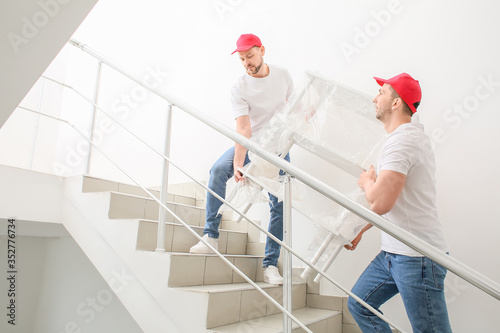 Loaders carrying furniture ...