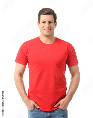 Man in stylish t-shirt on w...