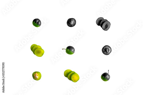 Green sour plum. Greengage on isolated on white background. Colorful, black and white. Top view. Copy space for text message. Creative concept.