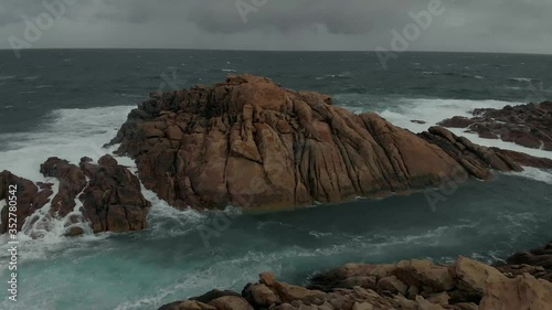 Canal Rocks
Western Australia
Large Waves crash onto the Ancient Rocks-cape on a very cloudy Day photo