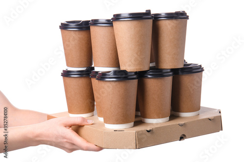 Hand holding stack of dispo...