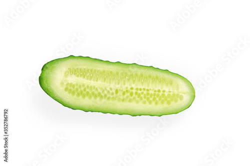 Slice of cucumber isolated on white with clipping path