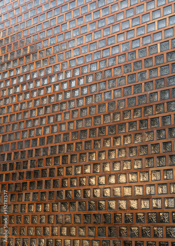 Glassblock with detail of wooden of architectureal facade photo