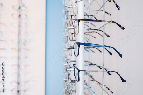 Eyeglasses placed in eyewear store.copy space.Focus selective. © JAVIER LARRAONDO
