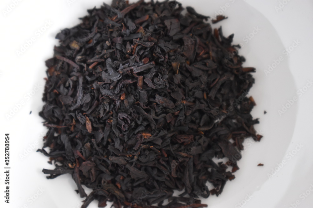 Black English breakfast tea leaves - can be used as a background Black English breakfast tea leaves - can be used as a background