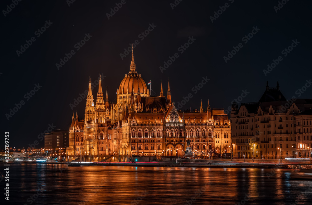 Long exposure view of Hungarian Paliament National Assembly by Danube river in the evening