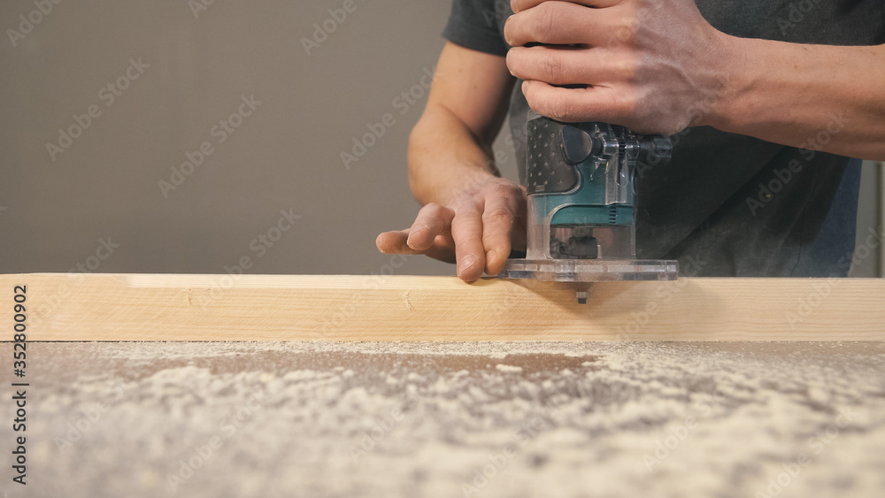 Bevel lumber by machine in wood factory. Bevel lumber by machine in wood factory.