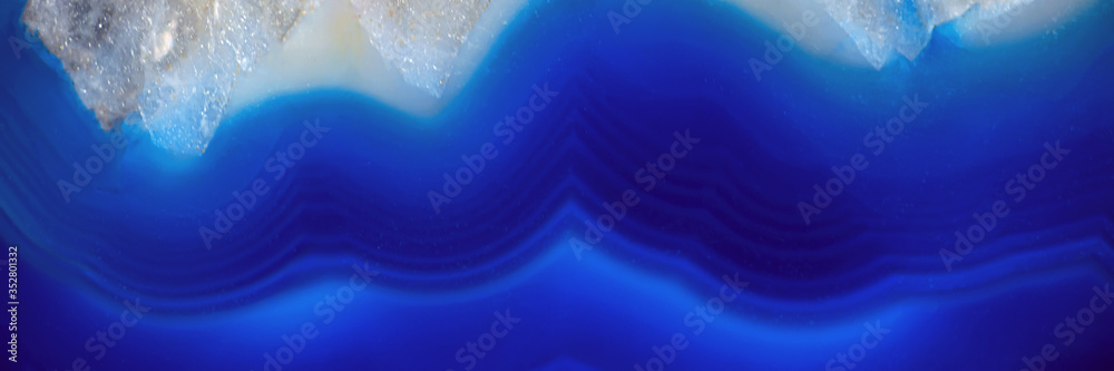 Decorative agate slab. Blue semi-precious stone. Abstract background for design