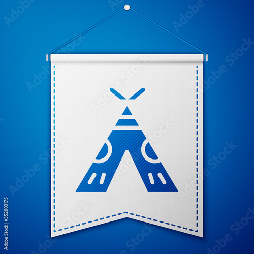 Blue Traditional indian teepee or wigwam icon isolated on blue background. Indian tent. White pennant template. Vector Illustration