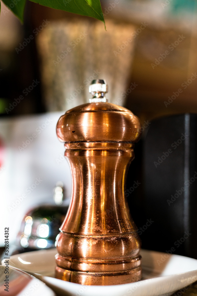 Brown metal pepper shaker. Bronze pepper shaker. Brown metal pepper shaker. Bronze pepper shaker.