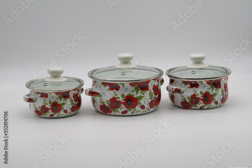 enameled pans on a white background