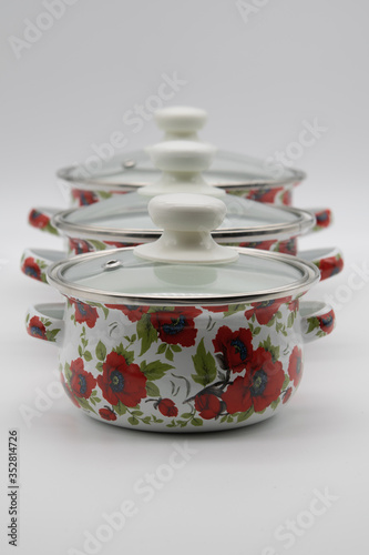 enameled pans on a white background
