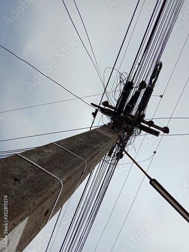 Electric poles and electrical cables in the sky