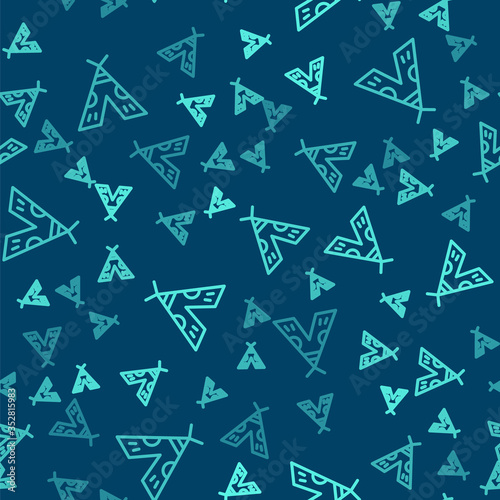 Green line Traditional indian teepee or wigwam icon isolated seamless pattern on blue background. Indian tent. Vector Illustration