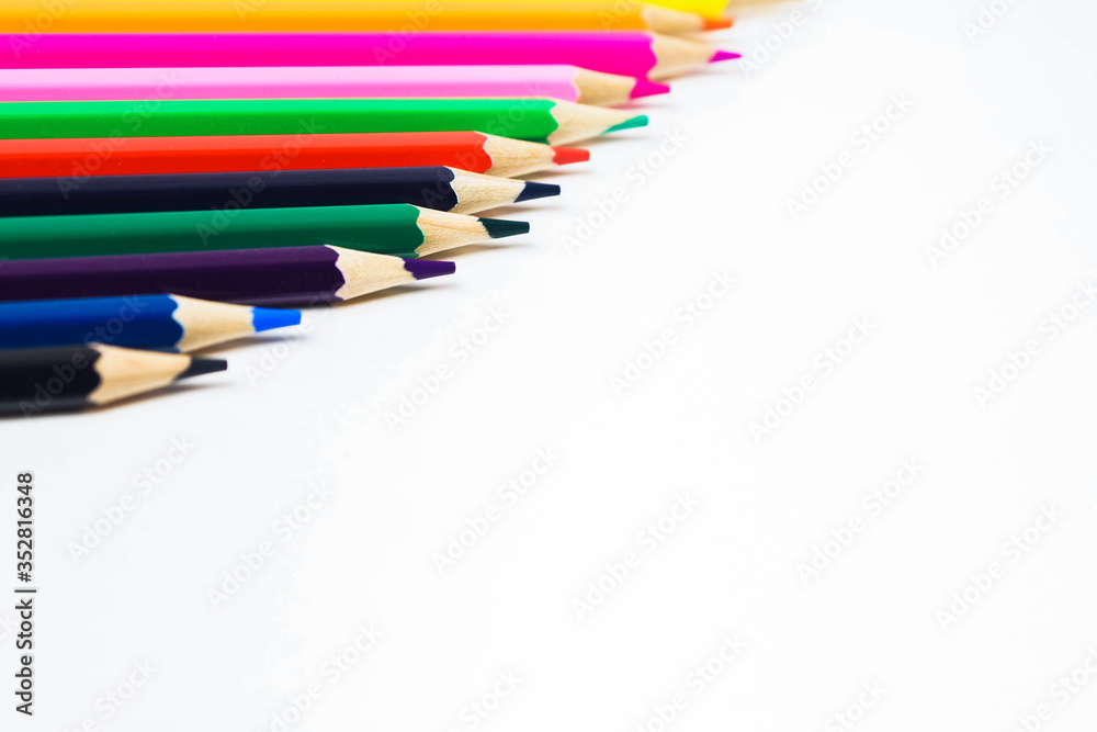 Color pencils on white background, copy space Color pencils on white background, copy space