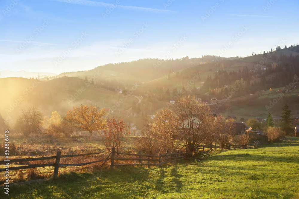 Beautiful picturesque landscape of a mountain village in the fall. Beautiful picturesque landscape of a mountain village in the fall.