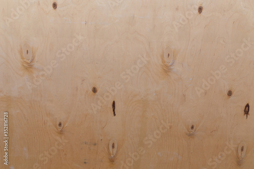 Brown wooden board or plywood texture background or backdrop