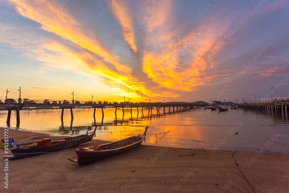 Fototapeta premium sunrise at Chalong pier. Chalong bay is the most important marina of Phuket there have 2 piers and customs at pier..