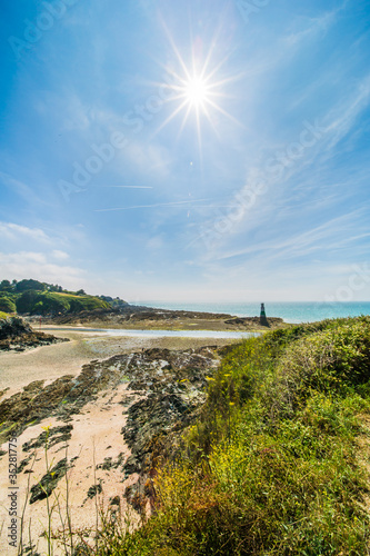 Pléneuf-Val-André Lighthouse with Turquoise Blue Atlantic Ocean on a Sunny Summer Day in Brittany France