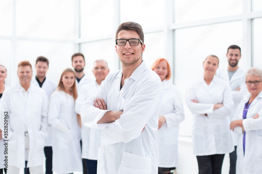 group of confident medical professionals standing together.