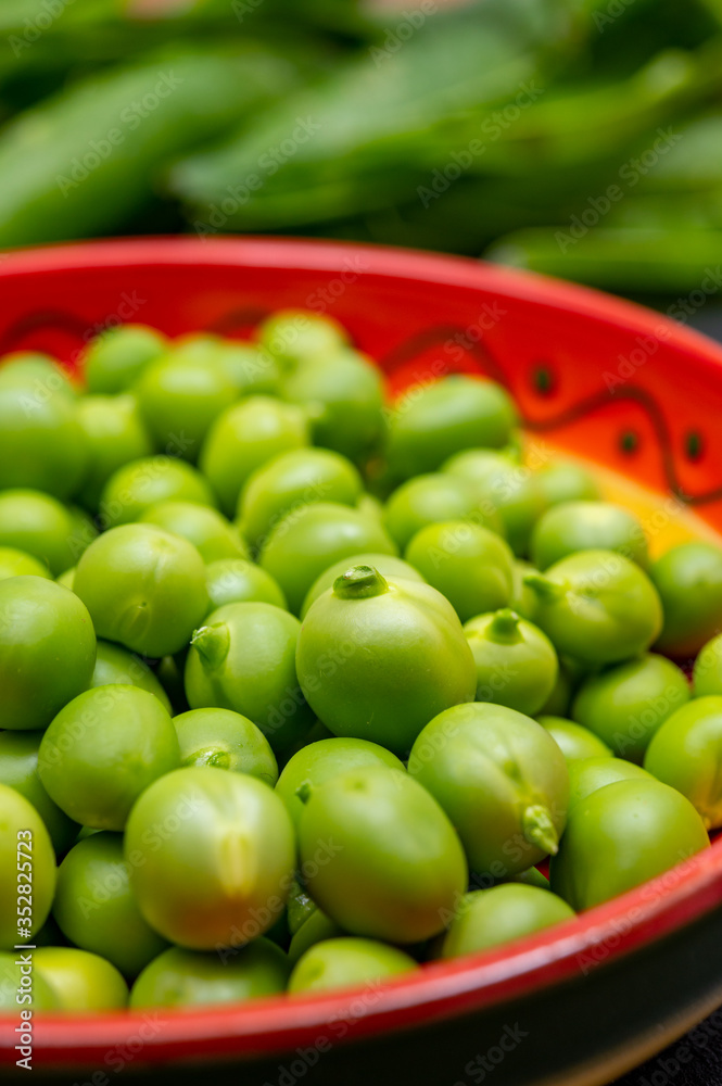 New harvest of ripe green peas legumes New harvest of ripe green peas legumes