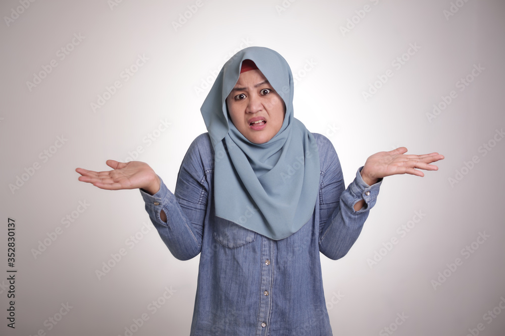 Muslim Woman shows Denial or Refusal Gesture, Shrug Muslim Woman shows Denial or Refusal Gesture, Shrug