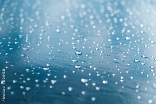 Water drops on a transparent polythene after a rain as a background image. Copy, empty space for text