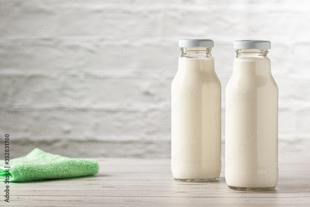 Homemade kefir or yogurt with probiotics on a white background with copy space. Kefir Lose weight diet concept. Homemade kefir or yogurt with probiotics on a white background with copy space. Kefir Lose weight diet concept.