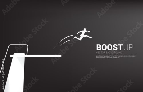 Silhouette of businessman jump higher with springboard. Concept of boost and growth in business.