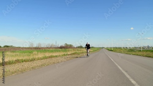 Pedaling Road Bicycle, sport concept, cycling road bike on highway photo