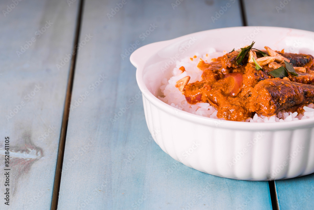 Alige Rice tomato sardines with crab fat on topped of rice or also known as aligue ...
