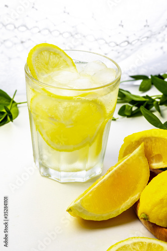 Tradition Summer drink mojito with lime and mint. Top view with copy space.