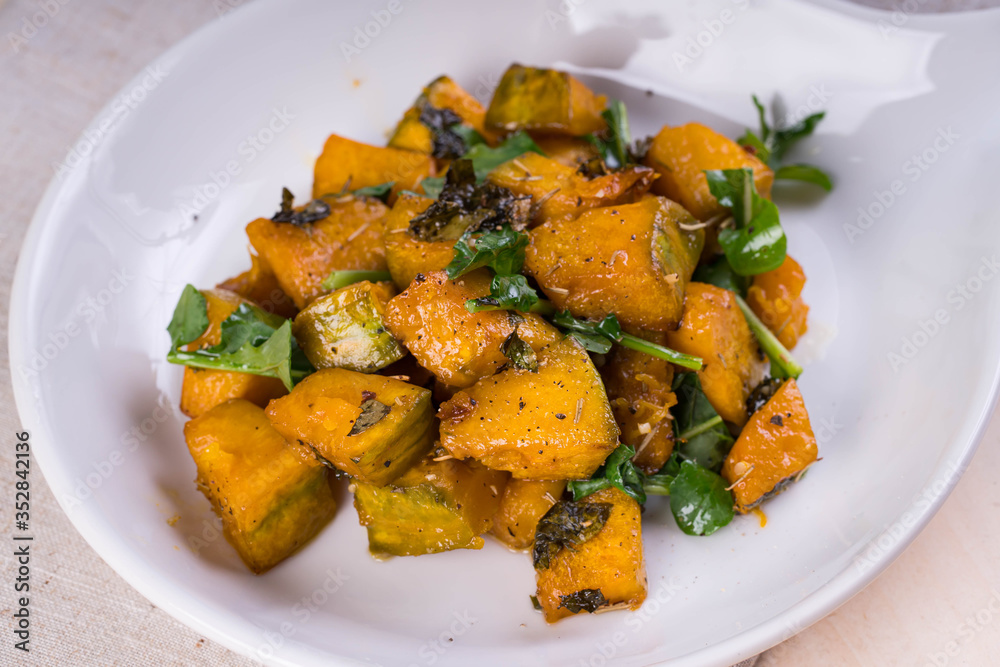 sweet and salty baked pumpkin with fresh rosemary and arugula sweet and salty baked pumpkin with fresh rosemary and arugula