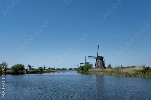 beautiful windmill landscape at kinderdijk in the netherlands