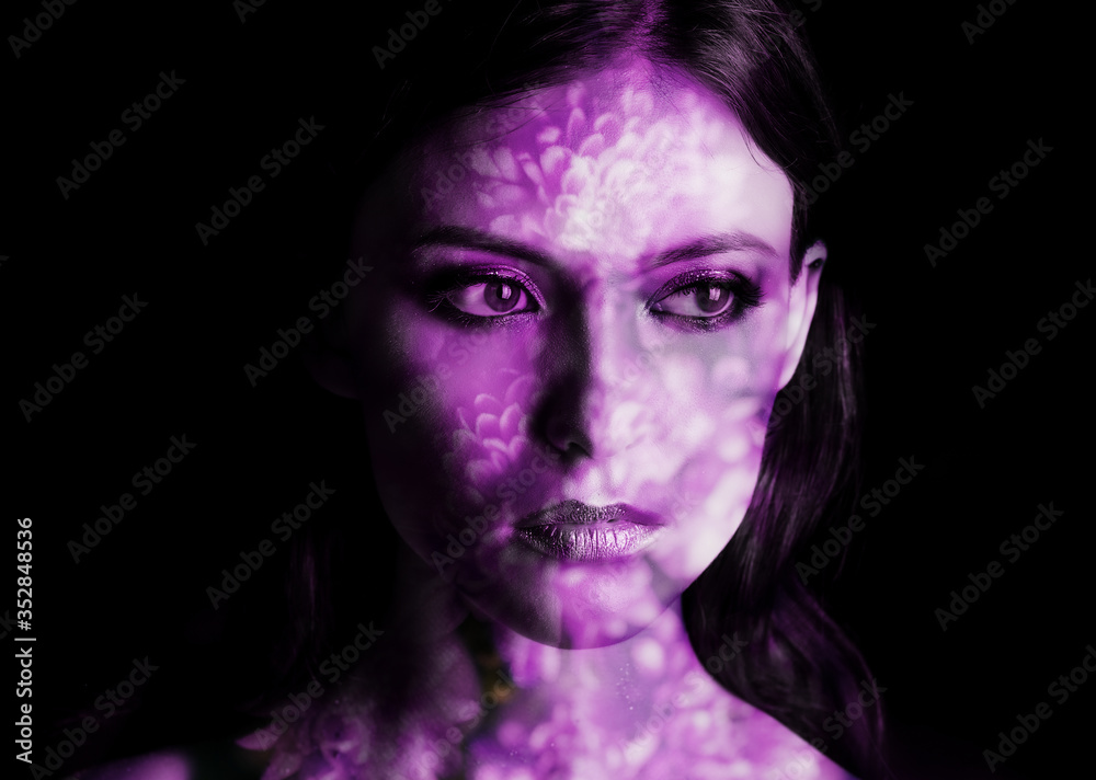 Double exposure of young woman and flowers.
