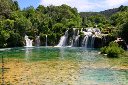 Beautiful waterfalls in National Park Krka  Croatia on a sunny summer day. 