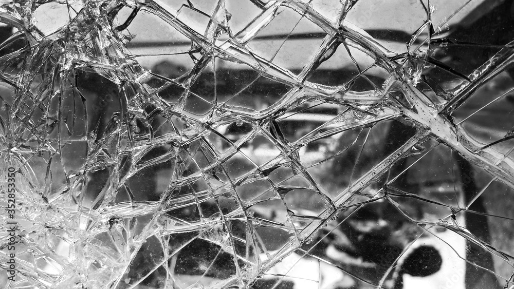 The broken windshield of the car. Glass splinter. An accident with the ...