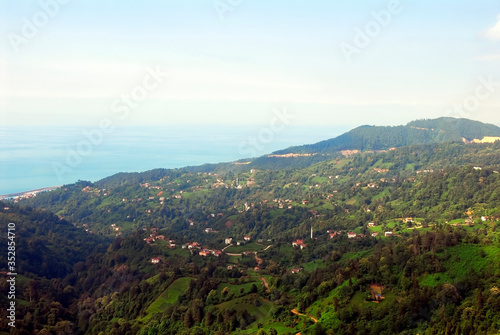 TRABZON, TURKEY - JUNE 28, 2008: Yeniay Village and Black Sea. Surmene District photo