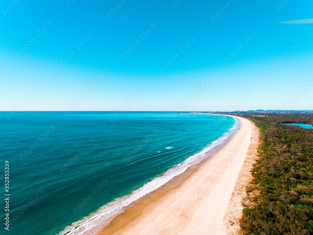 drone shot of beach and ocean