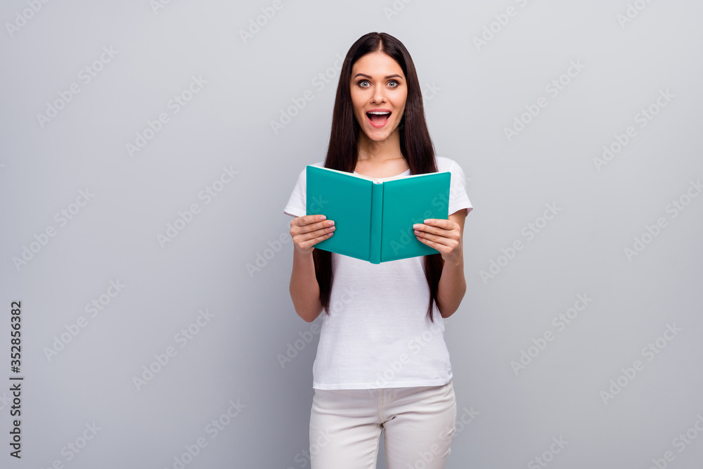 Portrait of her she nice attractive lovely intelligent smart clever cheerful cheery straight-haired girl reading scientific book isolated over light gray pastel color background Portrait of her she nice attractive lovely intelligent smart clever cheerful cheery straight-haired girl reading scientific book isolated over light gray pastel color background
