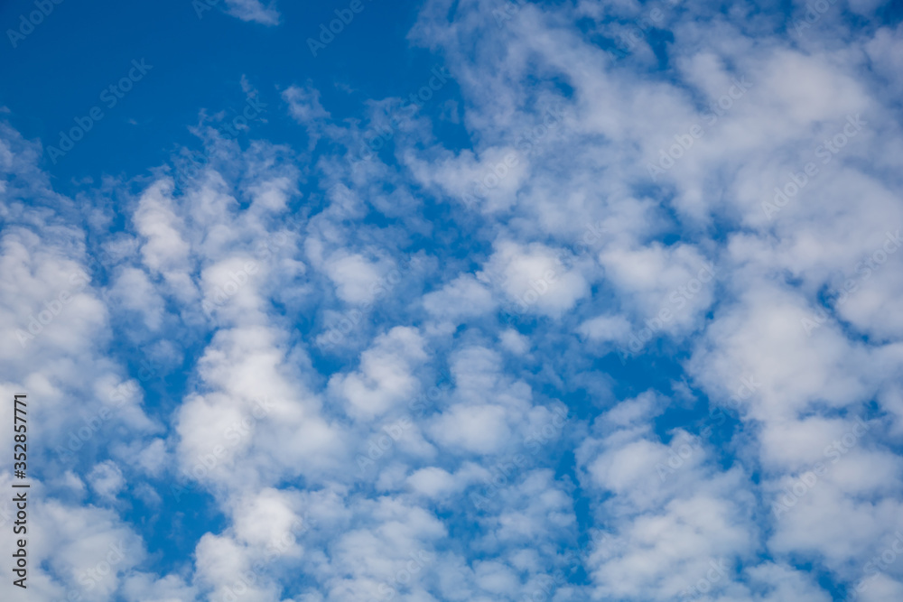 Obraz premium Blue sky with white clouds, background