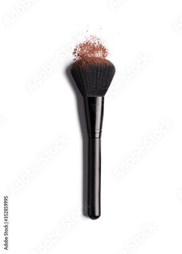 Makeup brush with face powder, isolated on white background