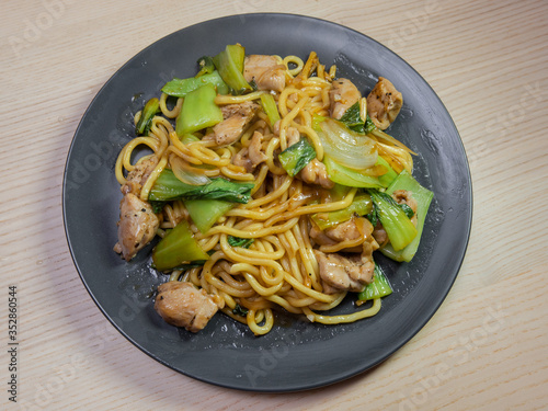 A plate of chicken and vegetable yakisoba (fried noodle).