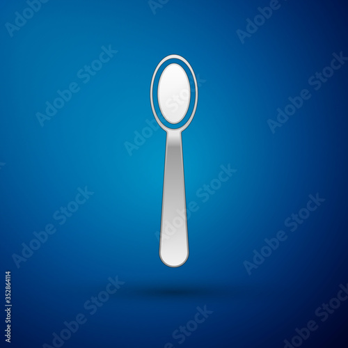 Silver Disposable plastic spoon icon isolated on blue background. Vector Illustration